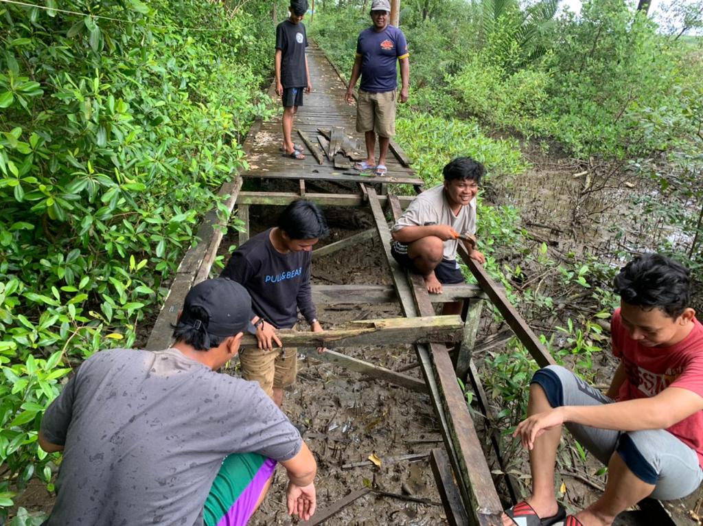 Perbaikan jalan muara pantuan  - tani baru